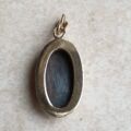 Oval Hematite Pendant in 9ct Gold.