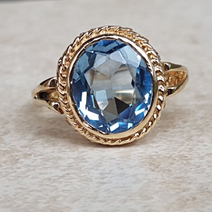 Pretty Synthetic Blue Spinel Solitaire Ring in 9ct Gold, a UK O or a US 7 1/4.