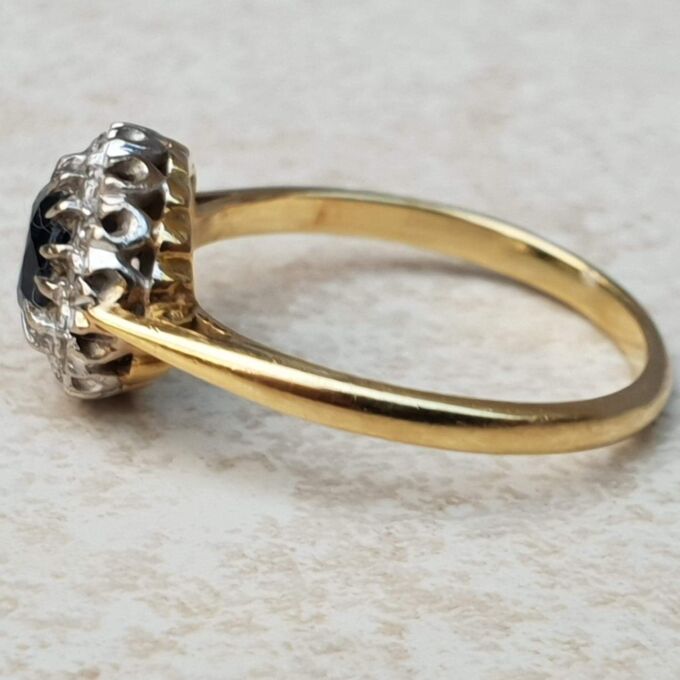 Sapphire and Diamond Halo ring in 18ct Gold and Platinum, a UK M or a US 6 1/2.