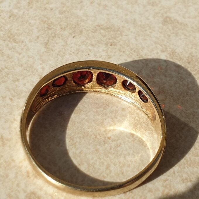 Six Stone Graduating Garnet Band Ring in 9ct Gold, a UK S or a US 9 1/4