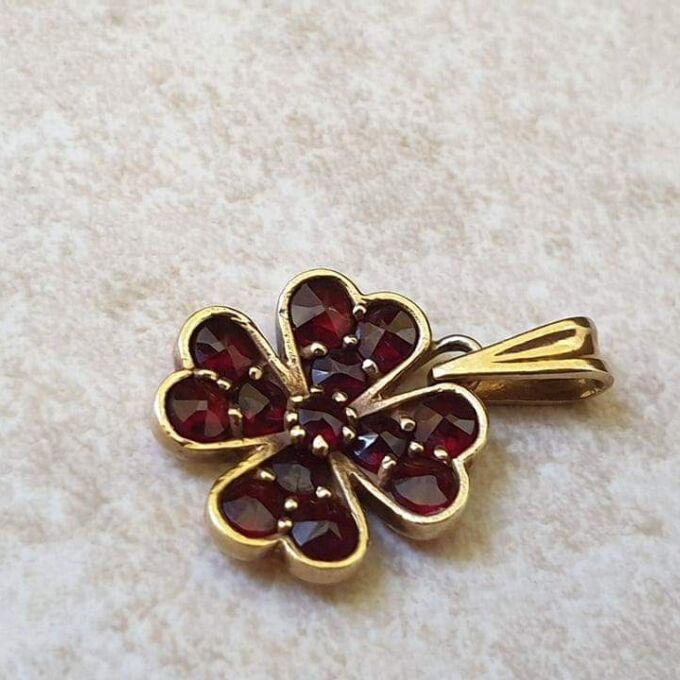 Garnet Four Leaf Clover Pendant in 9ct Gold