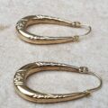 Creole Oval Hoop Earrings in 9ct Gold.