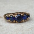 Vibrant Blue Five Stone Synthetic Sapphire Ring in 9ct Gold, a UK N or a US 7.