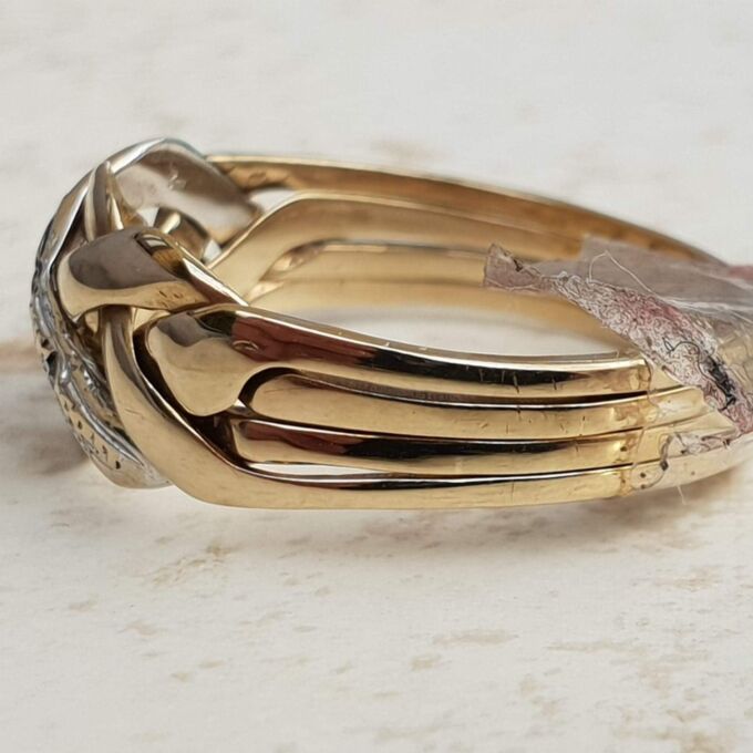 Four Piece Puzzle Ring with Diamond Accents in 9ct Gold, a UK P or a US 8.