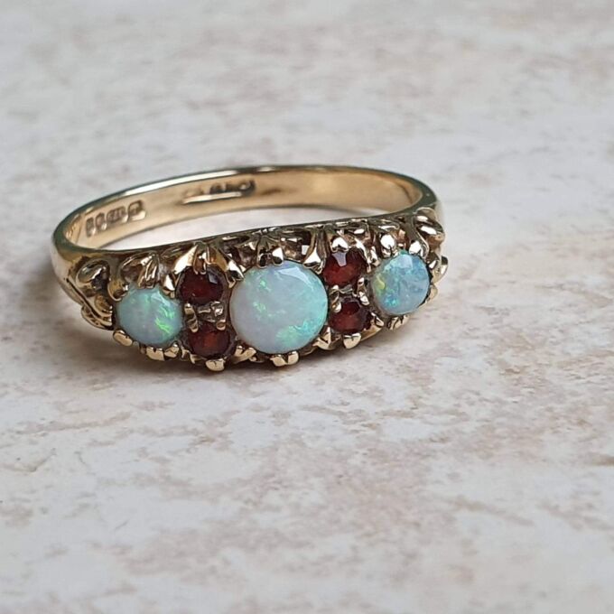Opal and Garnet Ring in 9ct Gold, a UK N or a US 7
