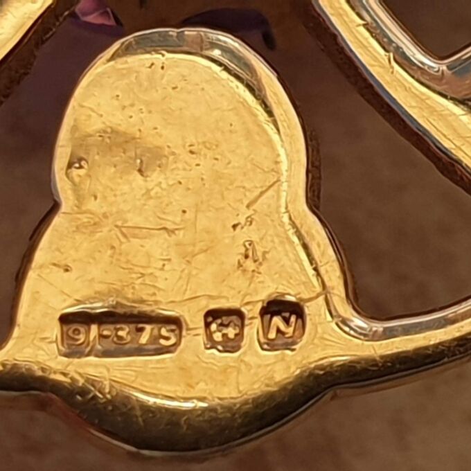 Celtic Style Amethyst Brooch in 9ct Gold.