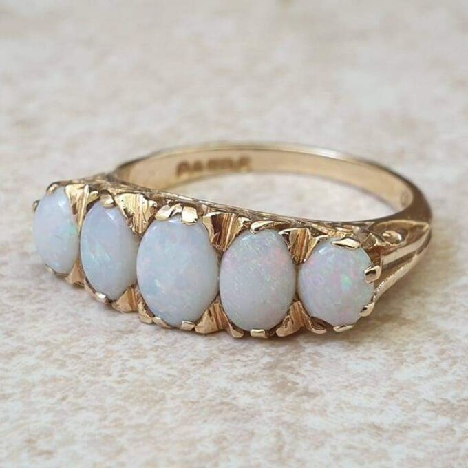 Graduating Five Stone Opal Ring in 9ct Gold, a UK O or a US 7 1/4