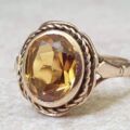 Vibrant Synthetic Yellow Sapphire in 9ct Gold, a UK N or a US 7