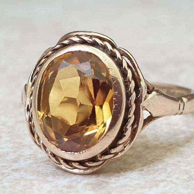 Vibrant Synthetic Yellow Sapphire in 9ct Gold, a UK N or a US 7