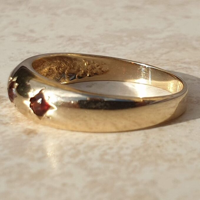 Three Stone Garnet Ring in 9ct Gold,  a UK O or a US 7 1/2.