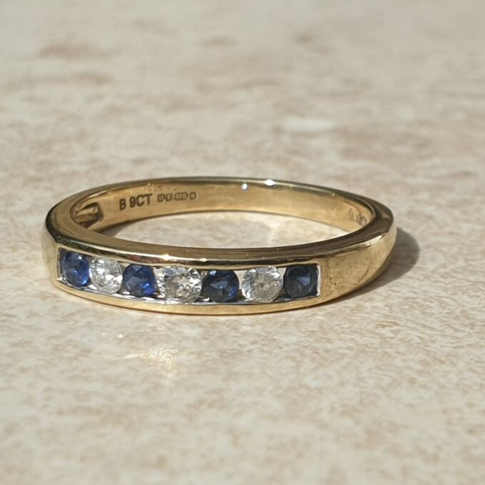 Channel Set Sapphire and Diamond Ring in 9ct Gold, a UK L 1/2 or a US 6 1/4