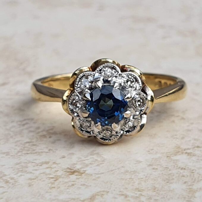 Sapphire and Diamond Daisy Ring in 18ct Gold,  a UK J or a US 5.
