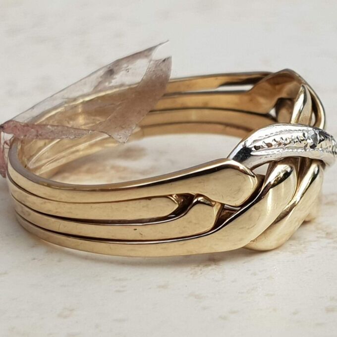 Four Piece Puzzle Ring with Diamond Accents in 9ct Gold, a UK P or a US 8.