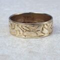 Broad Abstract Patterned Band in 9ct Gold,  a UK T or a US 10.