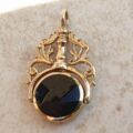 Ornate Double Sided Agate and Onyx Spinner Fob in 9ct Gold.