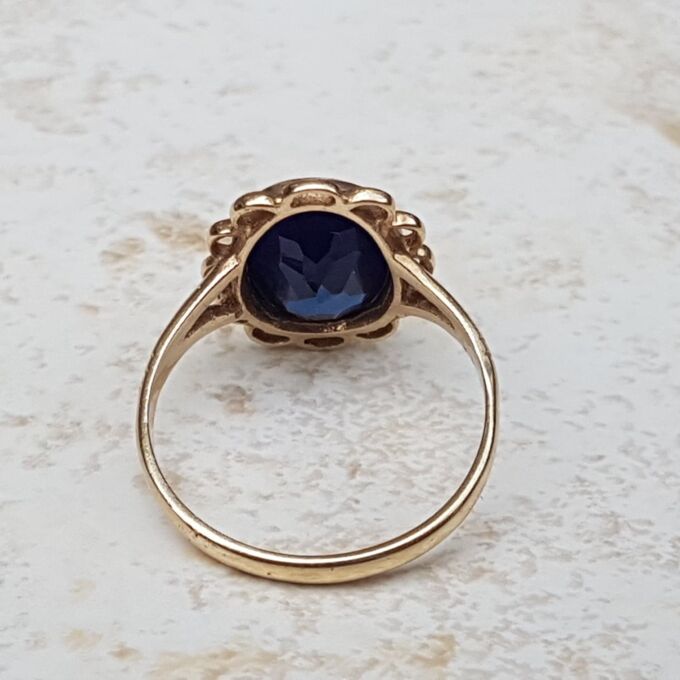 Synthetic Sapphire Solitaire Ring in 9ct Gold, a UK K or a US 5 3/4.