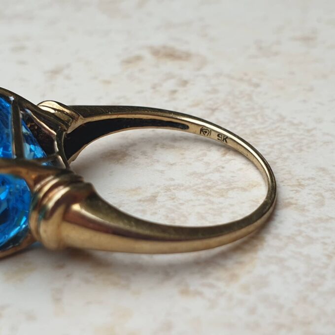 Vibrant East West Topaz Ring in 9ct Gold, a UK P or a US 8.