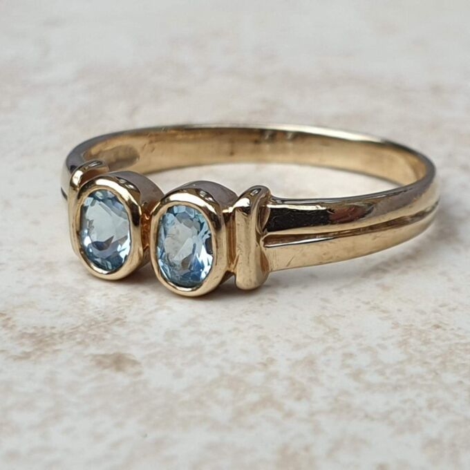 Torque Style Topaz Ring in 9ct Gold,  a UK M or a US 6 1/2.