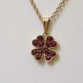 Garnet Four Leaf Clover Pendant in 9ct Gold