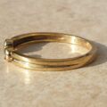Diamond Set Torque Ring in 9ct Gold,  a UK M 1/2 or a US 6 3/4.