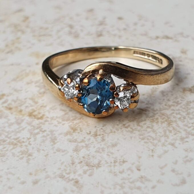 Topaz & Diamond Crossover Trilogy Ring in 9ct Gold.