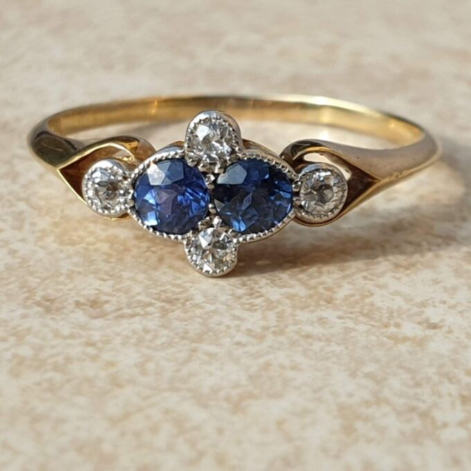 Twin Sapphire and Diamond Ring in 18ct Gold,  a UK P or a US 8.