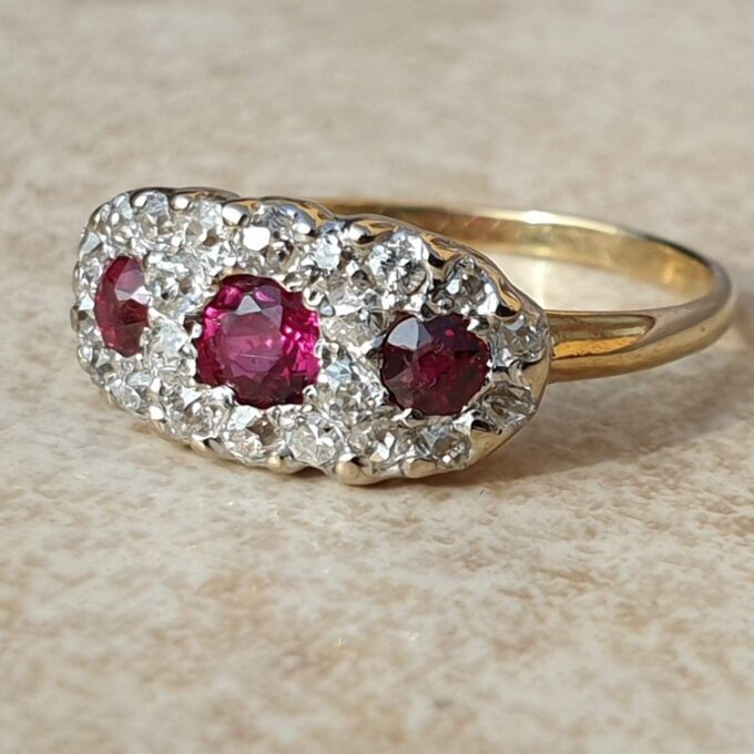 Trilogy Ruby and Diamond Ring in 18ct Gold,  a UK H 1/2 or a US 4 1/4.
