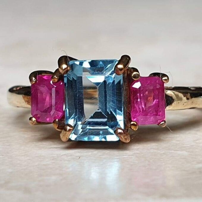 Topaz and Synthetic Ruby Trilogy Ring in 9ct Gold.