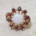 Opal and Garnet Halo Cluster Ring in 9ct Gold.
