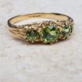 Summery Peridot Three Stone Ring in 9ct Gold, a UK N 1/2 or a US 7 1/4.