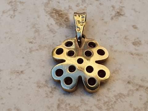 Garnet Four Leaf Clover Pendant in 9ct Gold