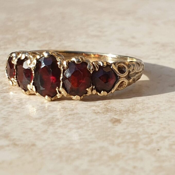 Graduating Five Stone Garnet Ring in 9ct Gold,  a UK N 1/2 or a US almost 7 1/4.