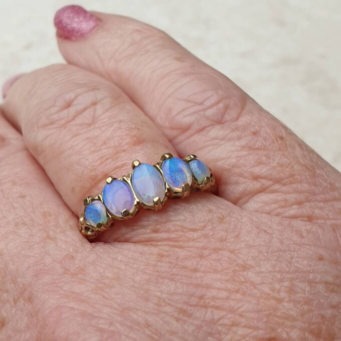Graduating Five Stone Opal Ring in 9ct Gold,  a UK O or a US 7 3/4.