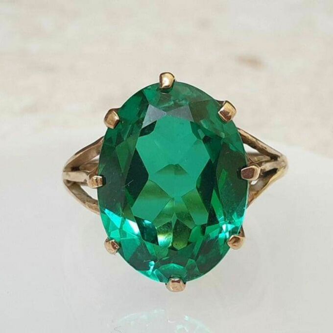 Emerald Green Synthetic Spinel Solitaire in 9ct Gold, a UK I or a US 4 1/2