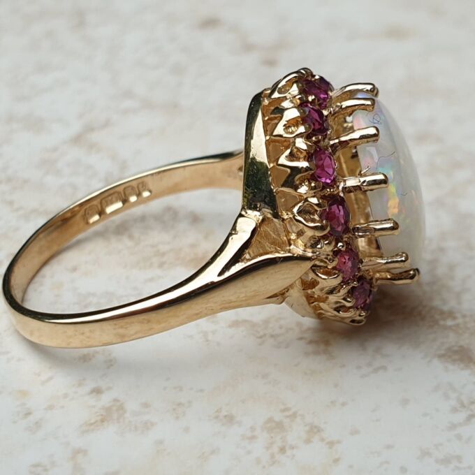 Opal & Ruby Ring in 9ct Gold, a UK O or a US 7 1/2