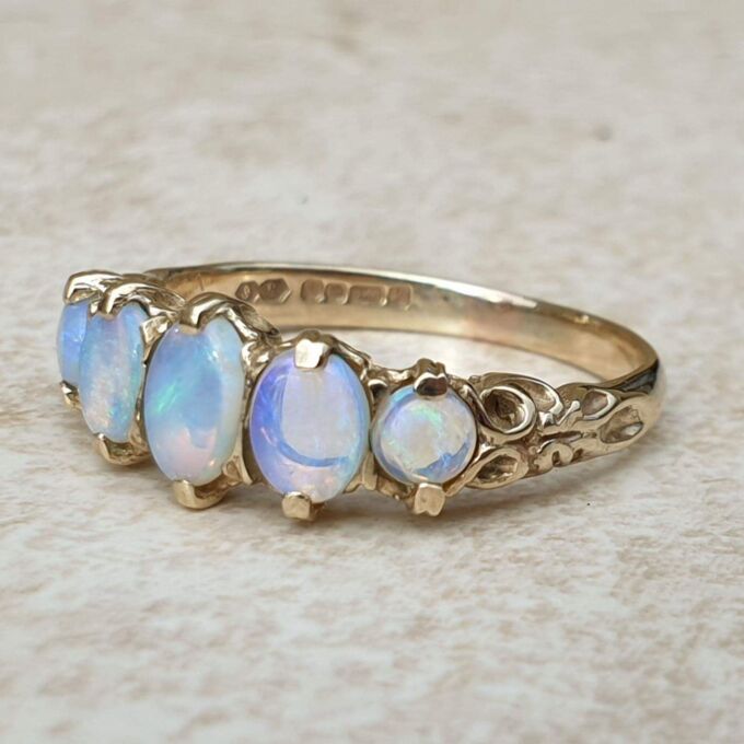 Graduating Five Stone Opal Ring in 9ct Gold,  a UK O or a US 7 3/4.