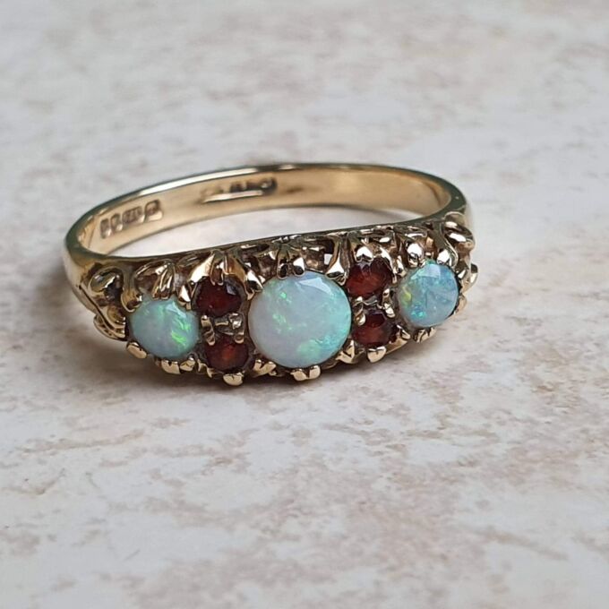 Opal and Garnet Ring in 9ct Gold, a UK N or a US 7