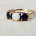 Opal and Sapphire Trilogy Ring in 9ct Gold, a UK J 1/2 or a US 5 1/4.