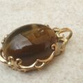 Striking Tigers Eye Pendant in 9ct Gold.