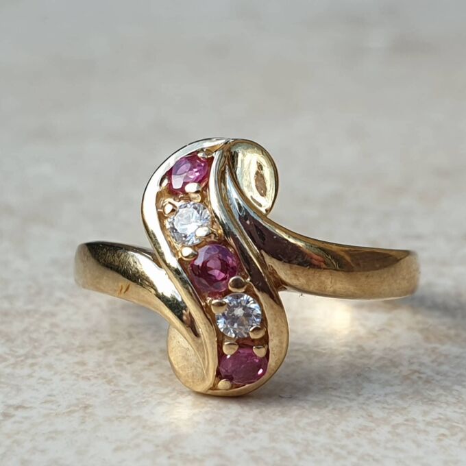 Ruby & Paste Scroll Ring in 9ct Gold.