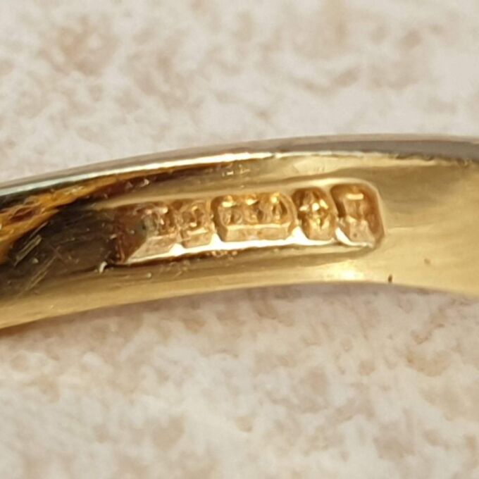 Ruby and Diamond Chevron Ring in 18ct Gold,  a UK M 1/2 or a US 6 3/4.