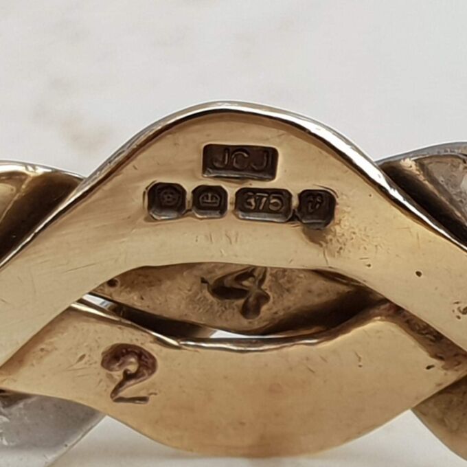 Four Piece Puzzle Ring with Diamond Accents in 9ct Gold, a UK P or a US 8.