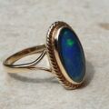 Oval Opal Doublet Ring in 9ct gold, a UK O or a US 7 1/2