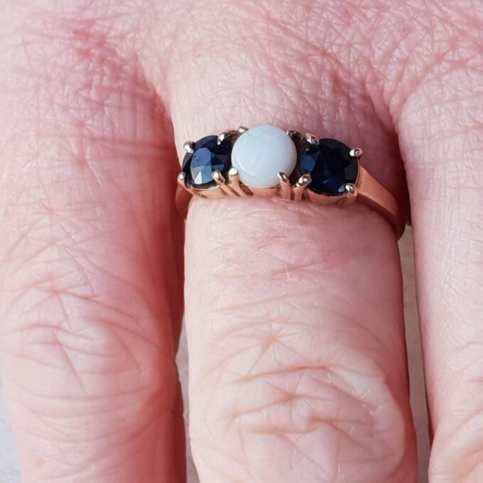 Opal and Sapphire Trilogy Ring in 9ct Gold, a UK J 1/2 or a US 5 1/4.