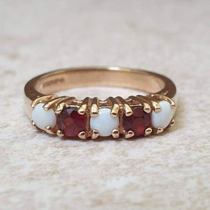 Opal and Garnet Ring in 9ct Gold, a UK J or a US 5
