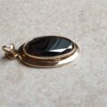 Oval Hematite Pendant in 9ct Gold.