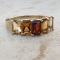 Garnet and Citrine Five Stone Ring in 9ct Gold,  a UK P 1/2 or a US 8 1/4.