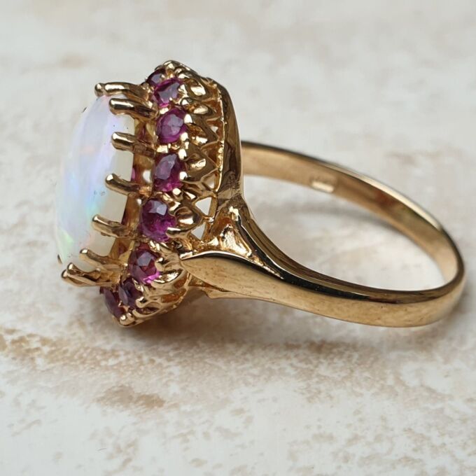 Opal & Ruby Ring in 9ct Gold, a UK O or a US 7 1/2