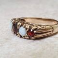 Five Stone Opal and Garnet 9ct Gold Ring, a UK K 1/2 or a US size 5 3/4.