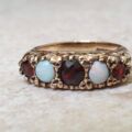 Five Stone Opal and Garnet 9ct Gold Ring, a UK K 1/2 or a US size 5 3/4.